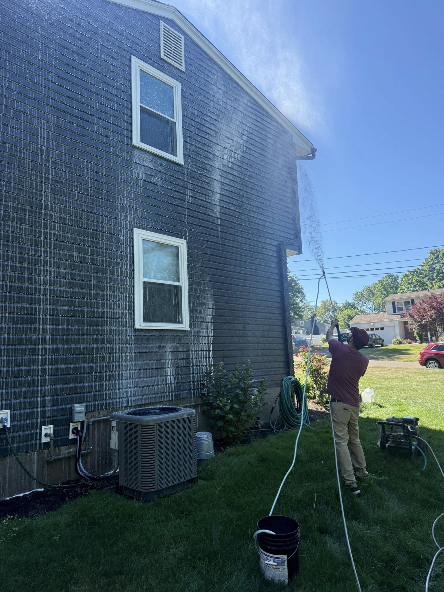Siding soft wash in progress